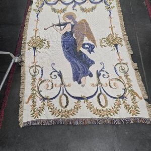 Beautiful angel throw, or you can hang